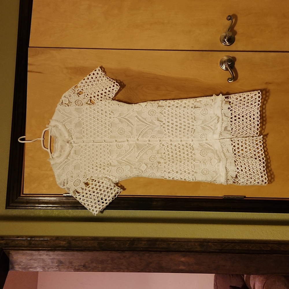 White lace dress with pearl button front